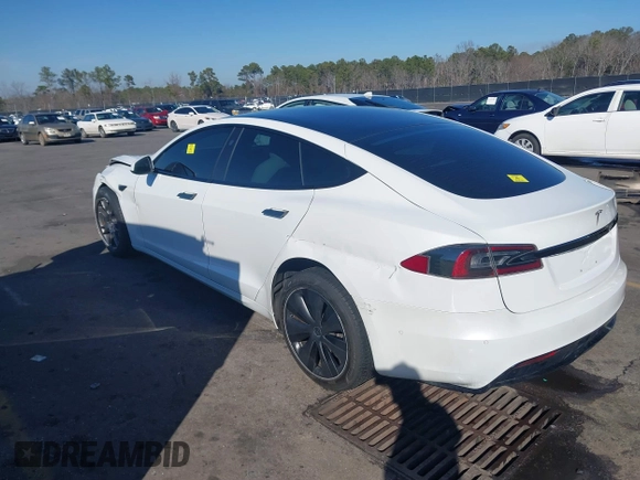 2021 Tesla Model S Long Range with VIN 5YJSA1E56MF453711, listed as a IAAI auction lot 41467603 with 115,634 mi miles and . Bid and sale history available at DreamBid. Image 3.
