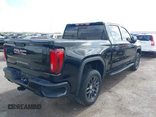 2021 GMC Sierra 1500 AT4 z VIN 1GTP9EELXMZ304412, wystawiony jako IAAI lot #41069878 z przebiegiem 48 987 mil mil oraz . Historia ofert i sprzedaży dostępna na DreamBid. Obrazek 4.