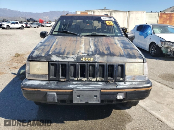 1993 Jeep Grand Cherokee Limited with VIN 1J4GZ78S3PC502345, listed as a Copart auction lot 46933805 with 121,652 mi miles and Salvage title. Bid and sale history available at DreamBid. Image 5.