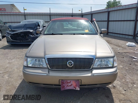 2004 Mercury Grand Marquis LS Premium z VIN 2MEFM75W34X674542, wystawiony jako IAAI lot #42018186 z przebiegiem 137 944 mil mil oraz . Historia ofert i sprzedaży dostępna na DreamBid. Obrazek 13.