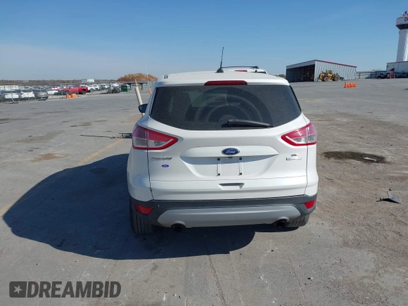 2014 Ford Escape SE with VIN 1FMCU0G99EUA71540, listed as a IAAI auction lot 40651416 with 230,849 mi miles. Bid and sale history available at carsss.com. Image 13.