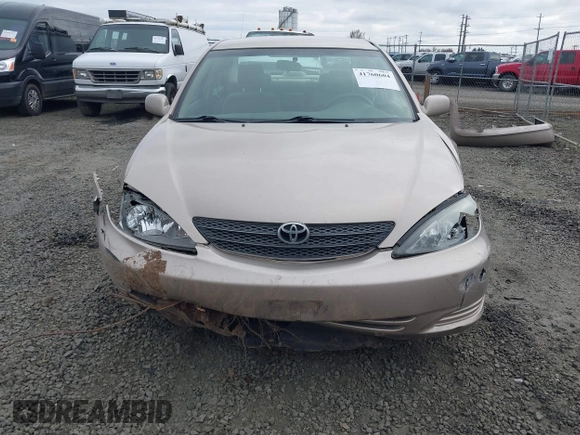 2002 Toyota Camry LE z VIN 4T1BE32K72U028489, wystawiony jako IAAI lot #41760604 z przebiegiem 163 950 mil mil oraz . Historia ofert i sprzedaży dostępna na DreamBid. Obrazek 13.
