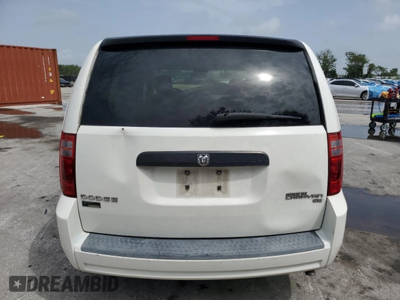 2009 Dodge Grand Caravan SE z VIN 1D8HN44E49B520433, wystawiony jako Copart lot #59439605 z przebiegiem Nie podano mil oraz Szkoda całkowita • Salvage title. Historia ofert i sprzedaży dostępna na DreamBid. Obrazek 6.