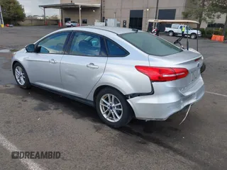 2016 Ford Focus SE with VIN 1FADP3F25GL384296, listed as a IAAI auction lot 41765750 with 158,695 mi miles. Bid and sale history available at carsss.com. Image 3.
