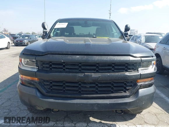 2018 Chevrolet Silverado 1500 Work Truck with VIN 3GCUKNEC6JG463656, listed as a IAAI auction lot 41621657 with 151,580 mi miles. Bid and sale history available at carsss.com. Image 12.