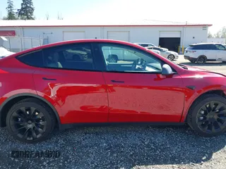 2022 Tesla Model Y Long Range with VIN 7SAYGDEE7NF549278, listed as a IAAI auction lot 42072801 with 39,374 mi miles and . Bid and sale history available at carsss.com. Image 14.