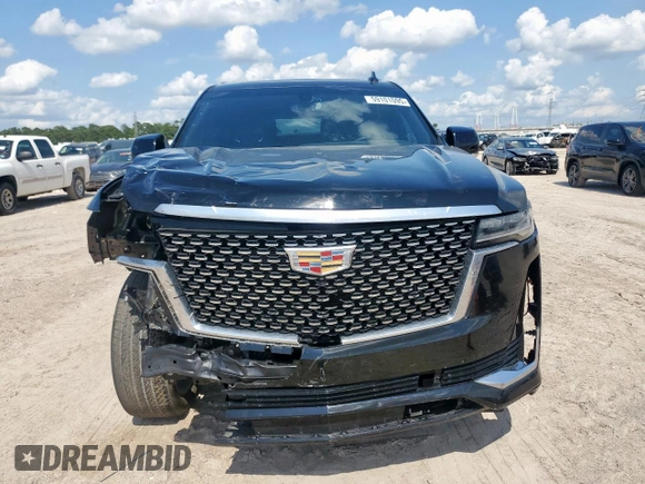2023 Cadillac Escalade z VIN 1GYS3KKL9PR262067, wystawiony jako Copart lot #59101095 z przebiegiem 43 884 mil mil oraz Szkody całkowita. Historia ofert i sprzedaży dostępna na DreamBid. Obrazek 5.
