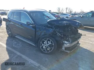 2017 BMW X1 xDrive28i with VIN WBXHT3C37H5F82992, listed as a IAAI auction lot 41293740 with 161,418 mi miles. Bid and sale history available at carsss.com. Image 1.