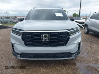 2024 Honda Pilot Touring z VIN 5FNYG1H71RB005034, wystawiony jako IAAI lot #42371878 z przebiegiem Nie podano mil oraz . Historia ofert i sprzedaży dostępna na DreamBid. Obrazek 11.