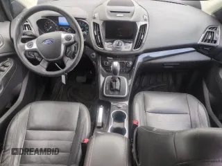 2014 Ford Escape Titanium with VIN 1FMCU9J97EUB30467, listed as a Copart auction lot 54949035 with 112,013 mi miles and Salvage Title. Bid and sale history available at DreamBid. Image 8.