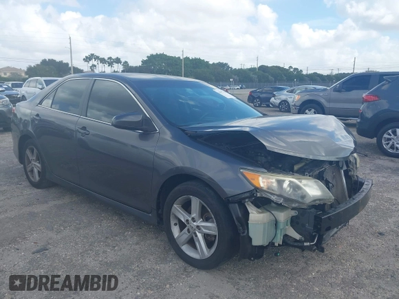 2012 Toyota Camry L with VIN 4T1BF1FK1CU165165, listed as a IAAI auction lot 41957566 with 127,048 mi miles. Bid and sale history available at carsss.com. Image 1.
