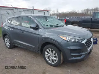 2019 Hyundai Tucson SE with VIN KM8J23A48KU923772, listed as a IAAI auction lot 42069850 with 57,692 mi miles. Bid and sale history available at carsss.com. Image 1.