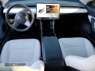 2020 Tesla Model 3 Standard Range Plus with VIN 5YJ3E1EA6LF615079, listed as a Copart auction lot 44259525 with 25,464 mi miles and Salvage Title. Bid and sale history available at DreamBid. Image 8.