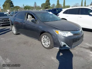 2014 Toyota Camry Hybrid LE with VIN 4T1BD1FK5EU106743, listed as a IAAI auction lot 41323019 with 84,511 mi miles. Bid and sale history available at carsss.com. Image 1.