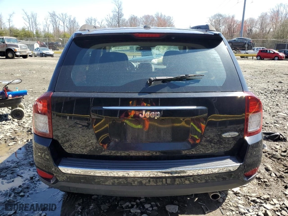 2017 Jeep Compass High Altitude with VIN 1C4NJCEA7HD125880, listed as a Copart auction lot 49104925 with 99,779 mi miles and Salvage Title. Bid and sale history available at carsss.com. Image 6.