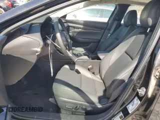 2024 Mazda 3 S Preferred с VIN 3MZBPACM2RM404675, выставлен на аукционе Copart как лот 63808045 с пробегом 2 145 миль миль и Списание • Salvage title. История ставок и продаж доступна на DreamBid. Изображение 7.