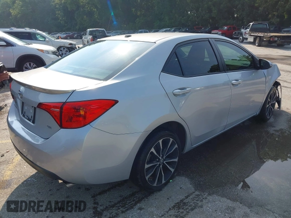 2017 Toyota Corolla L with VIN 2T1BURHE3HC925858, listed as a IAAI auction lot 42388175 with 101,057 mi miles and . Bid and sale history available at DreamBid. Image 4.