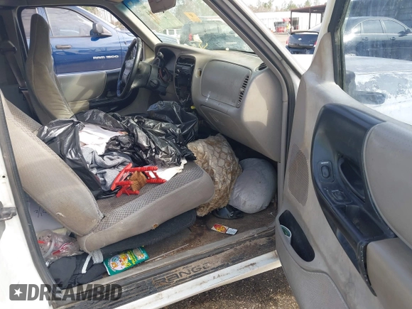 1999 Ford Ranger XLT with VIN 1FTYR14X1XTA56091, listed as a IAAI auction lot 41437904 with 187,149 mi miles and . Bid and sale history available at DreamBid. Image 5.