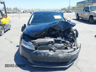 2012 Volkswagen Jetta S with VIN 3VW2K7AJ3CM469035, listed as a IAAI auction lot 42631129 with 208,768 mi miles and . Bid and sale history available at DreamBid. Image 12.