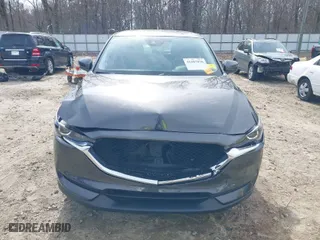 2017 Mazda CX-5 Touring with VIN JM3KFACLXH0125819, listed as a IAAI auction lot 41687038 with 101,769 mi miles. Bid and sale history available at carsss.com. Image 12.