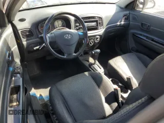 2007 Hyundai Accent SE z VIN KMHCN36C47U027122, wystawiony jako Copart lot #52224605 z przebiegiem 169 022 mil mil oraz Szkoda całkowita • Salvage title. Historia ofert i sprzedaży dostępna na DreamBid. Obrazek 8.