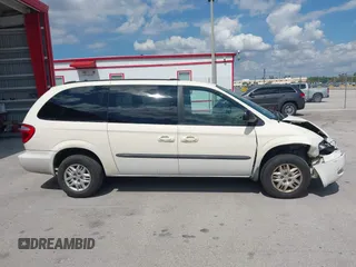 2003 Dodge Grand Caravan with VIN 2D4GP443X3R171373, listed as a IAAI auction lot 41645178 with 163,358 mi miles and . Bid and sale history available at DreamBid. Image 13.