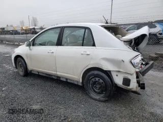 2007 Nissan Versa 1.8 SL with VIN 3N1BC11E67L402475, listed as a Copart auction lot 84464734 with 62,399 mi miles and Salvage Title. Bid and sale history available at carsss.com. Image 2.