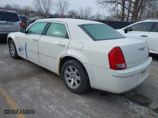 2006 Chrysler 300 Touring with VIN 2C3KA53G36H525834, listed as a IAAI auction lot 41274514 with 147,302 mi miles. Bid and sale history available at carsss.com. Image 3.