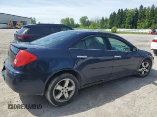 2009 Pontiac G6 1SA z VIN 1G2ZG57N294163678, wystawiony jako Copart lot #58538425 z przebiegiem 184 609 mil mil oraz Szkoda całkowita • Salvage title. Historia ofert i sprzedaży dostępna na DreamBid. Obrazek 3.