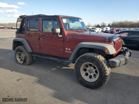 2007 Jeep Wrangler Unlimited X with VIN 1J4GA39107L196436, listed as a Copart auction lot 43336525 with 103,909 mi miles and Salvage Title. Bid and sale history available at carsss.com. Image 4.