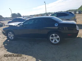 2013 Dodge Challenger SXT z VIN 2C3CDYAG4DH718894, wystawiony jako IAAI lot #42156336 z przebiegiem 153 000 mil mil oraz . Historia ofert i sprzedaży dostępna na DreamBid. Obrazek 14.