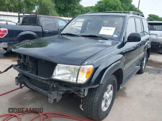 2000 Toyota Land Cruiser z VIN JT3HT05J1Y0081635, wystawiony jako IAAI lot #41938432 z przebiegiem 362 389 mil mil oraz . Historia ofert i sprzedaży dostępna na DreamBid. Obrazek 2.