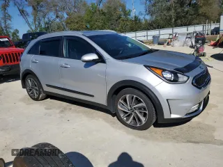 2019 Kia Niro Touring with VIN KNDCE3LC4K5215974, listed as a Copart auction lot 48774205 with 59,080 mi miles and Non Repairable. Bid and sale history available at carsss.com. Image 4.