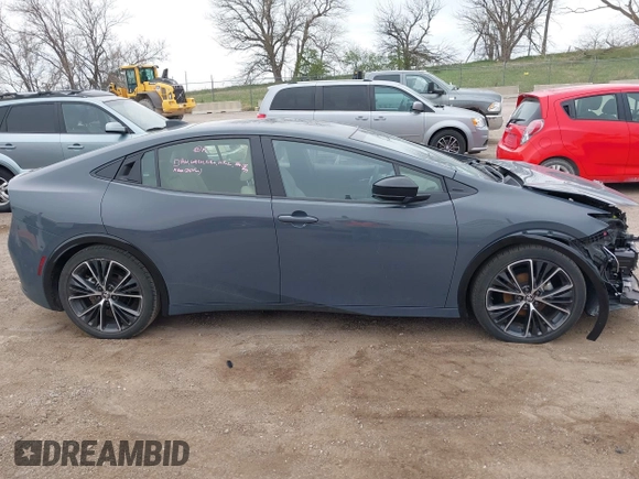 2024 Toyota Prius LE with VIN JTDACAAU8R3028529, listed as a IAAI auction lot 42079826 with 7,849 mi miles and . Bid and sale history available at DreamBid. Image 14.