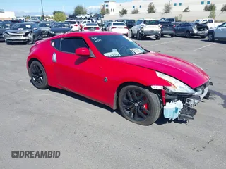 2014 Nissan 370Z Nismo with VIN JN1AZ4EH9EM636306, listed as a IAAI auction lot 41467766 with 101,021 mi miles and . Bid and sale history available at DreamBid. Image 1.
