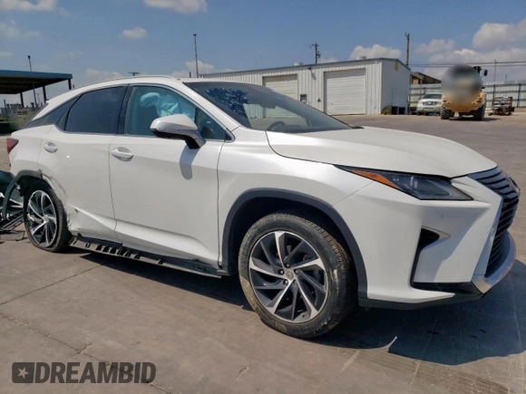 2017 Lexus RX 450h with VIN 2T2BGMCAXHC010399, listed as a Copart auction lot 53464995 with 32,530 mi miles and Salvage Title. Bid and sale history available at DreamBid. Image 4.