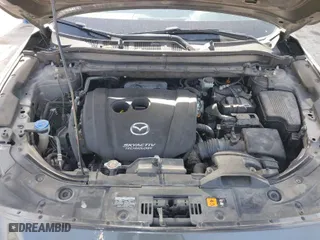 2019 Mazda CX-5 Touring with VIN JM3KFACMXK0686957, listed as a IAAI auction lot 41720338 with 95,421 mi miles. Bid and sale history available at carsss.com. Image 10.