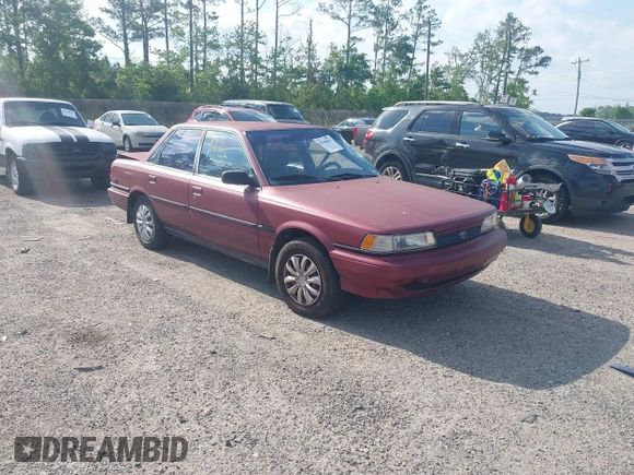 1991 Toyota Camry DLX z VIN 4T1SV21E0MU347371, wystawiony jako IAAI lot #42048695 z przebiegiem 209 451 mil mil oraz . Historia ofert i sprzedaży dostępna na DreamBid. Obrazek 1.