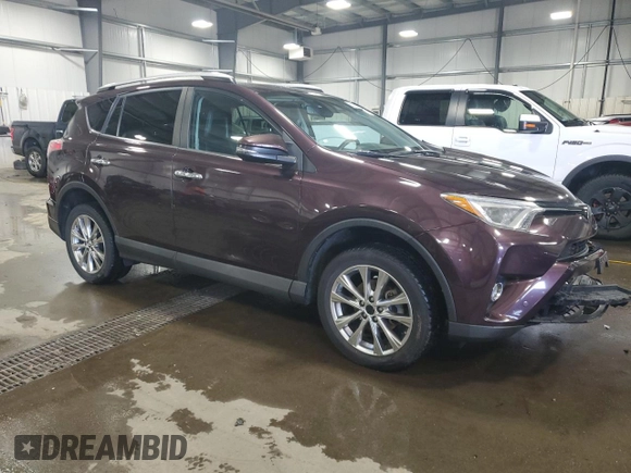 2016 Toyota RAV4 Limited with VIN 2T3DFREV3GW537010, listed as a Copart auction lot 52183005 with 133,558 mi miles and Salvage title. Bid and sale history available at DreamBid. Image 4.
