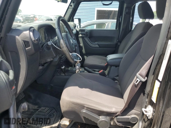 2017 Jeep Wrangler Unlimited Sport with VIN 1C4BJWDG7HL604106, listed as a Copart auction lot 65230065 with 143,628 mi miles and Clean title. Bid and sale history available at DreamBid. Image 7.