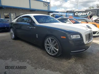 2014 Rolls-Royce Wraith z VIN SCA665C59EUX84411, wystawiony jako Copart lot #74548964 z przebiegiem Nie podano mil oraz Nie do naprawy. Historia ofert i sprzedaży dostępna na DreamBid. Obrazek 4.