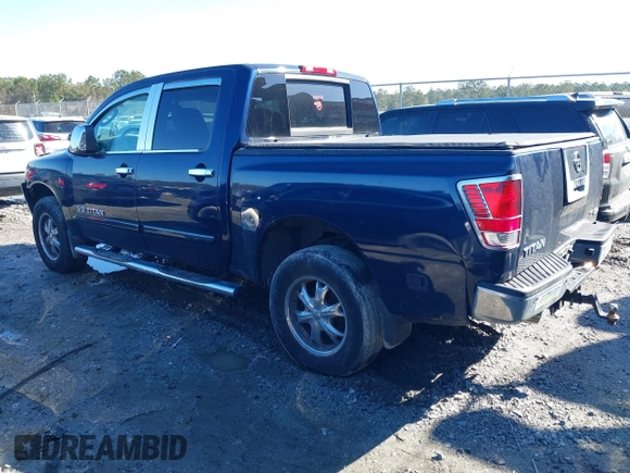 2011 Nissan Titan SL with VIN 1N6AA0EC0BN323844, listed as a IAAI auction lot 41768462 with 106,732 mi miles. Bid and sale history available at carsss.com. Image 3.