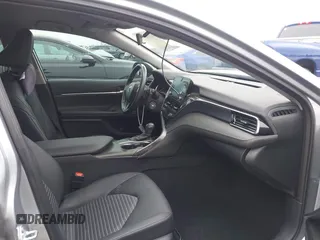 2023 Toyota Camry SE with VIN 4T1G11AKXPU809876, listed as a IAAI auction lot 42100546 with 35,055 mi miles and . Bid and sale history available at DreamBid. Image 5.