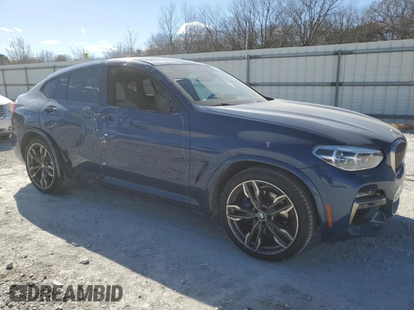 2020 BMW X4 M40i with VIN 5UX2V5C01LLE69394, listed as a Copart auction lot 44036774 with 22,582 mi miles and Clean title. Bid and sale history available at DreamBid. Image 4.