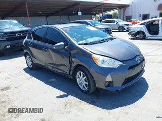 2012 Toyota Prius One z VIN JTDKDTB34C1015136, wystawiony jako IAAI lot #42332607 z przebiegiem 134 905 mil mil oraz . Historia ofert i sprzedaży dostępna na DreamBid. Obrazek 1.