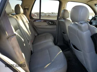 2005 GMC Envoy SLE с VIN 1GKDS13S852261326, выставлен на аукционе Copart как лот 42650025 с пробегом 210 485 миль миль и Списание • Salvage title. История ставок и продаж доступна на DreamBid. Изображение 10.