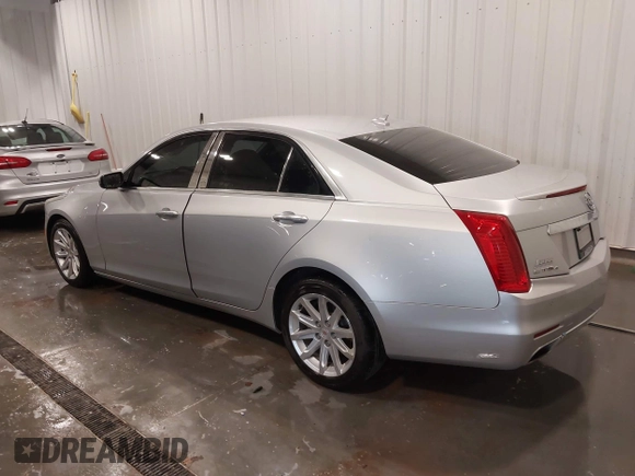 2014 Cadillac CTS Luxury AWD with VIN 1G6AX5SX3E0181029, listed as a IAAI auction lot 41895745 with 68,799 mi miles and . Bid and sale history available at DreamBid. Image 3.