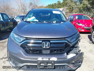 2021 Honda CR-V Touring with VIN 7FARW2H9XME012480, listed as a IAAI auction lot 41632487 with 59,684 mi miles. Bid and sale history available at carsss.com. Image 12.