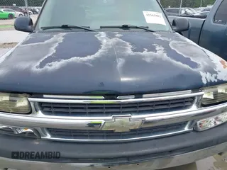 2005 Chevrolet Tahoe LS z VIN 1GNEC13T853189000, wystawiony jako IAAI lot #42361882 z przebiegiem 212 074 mil mil oraz . Historia ofert i sprzedaży dostępna na DreamBid. Obrazek 6.