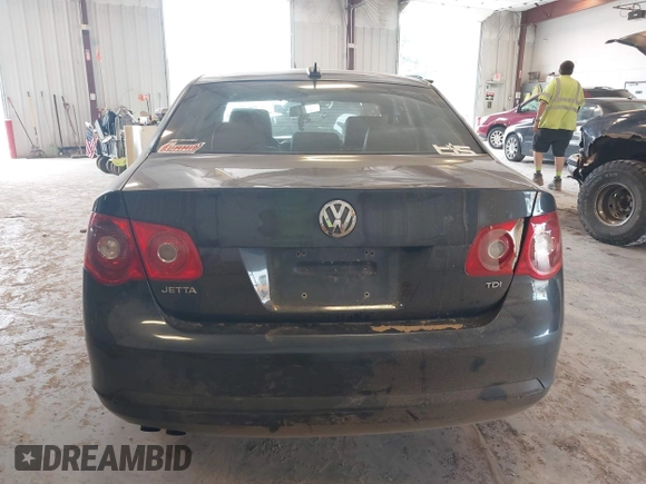 2006 Volkswagen Jetta 1.9L TDI z VIN 3VWDT71K26M624953, wystawiony jako IAAI lot #42420386 z przebiegiem 161 686 mil mil oraz . Historia ofert i sprzedaży dostępna na DreamBid. Obrazek 16.